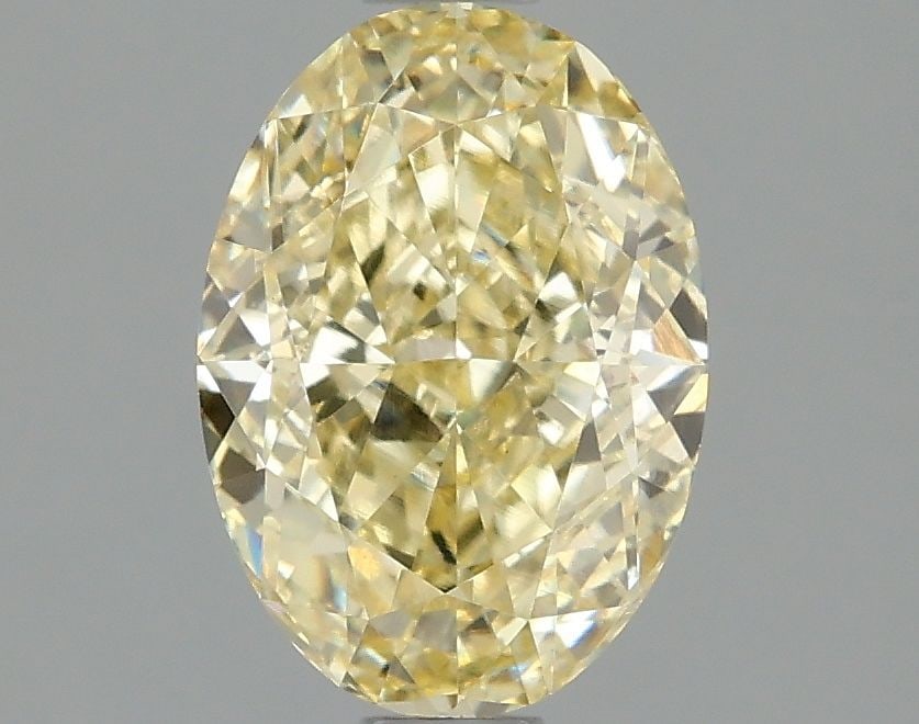 Loose Diamond - OVAL 1.55ct Fancy Intense Yellow VS1: Loose Diamond - OVAL 1.55ct Fancy Intense Yellow VS1 Source: This is a real non-mined Diamond that has been grown in a lab Shape: OVAL Carats: 1.55 Color: Fancy Intense Yellow Certification: IGI