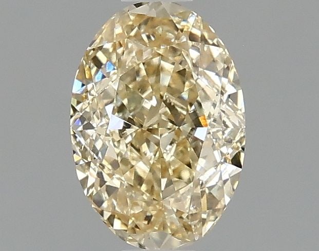 Loose Diamond - OVAL 1.0ct Fancy Yellow VVS2: Loose Diamond - OVAL 1.0ct Fancy Yellow VVS2 Source: This is a real non-mined Diamond that has been grown in a lab Shape: OVAL Carats: 1.0 Color: Fancy Yellow Certification: IGI Video: Video Link 