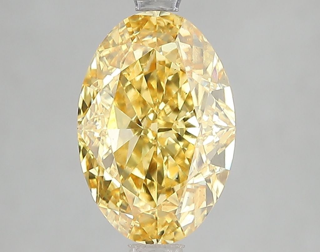 Loose Diamond - OVAL 3.03ct Fancy Vivid Yellow VS2: Loose Diamond - OVAL 3.03ct Fancy Vivid Yellow VS2 Source: This is a real non-mined Diamond that has been grown in a lab Shape: OVAL Carats: 3.03 Color: Fancy Vivid Yellow Certification: IGI Video: