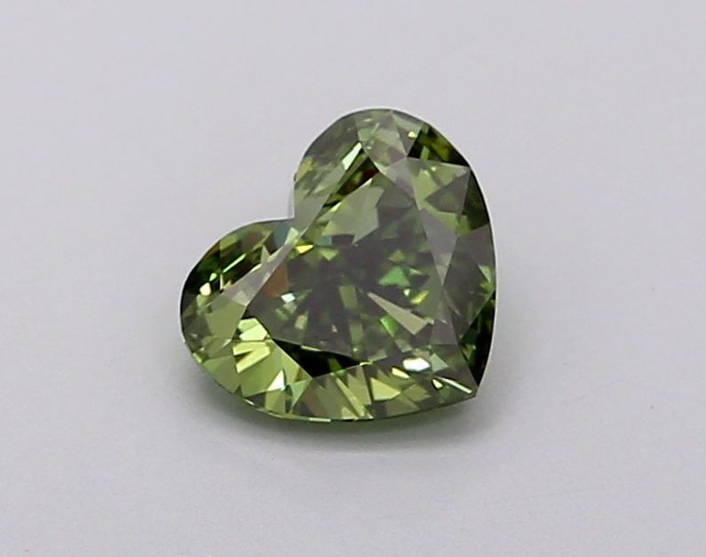 Loose Diamond - HEART 0.9ct Fancy Vivid Green VS1: Loose Diamond - HEART 0.9ct Fancy Vivid Green VS1 Source: This is a real non-mined Diamond that has been grown in a lab Shape: HEART Carats: 0.9 Color: Fancy Vivid Green Certification: IGI Video: