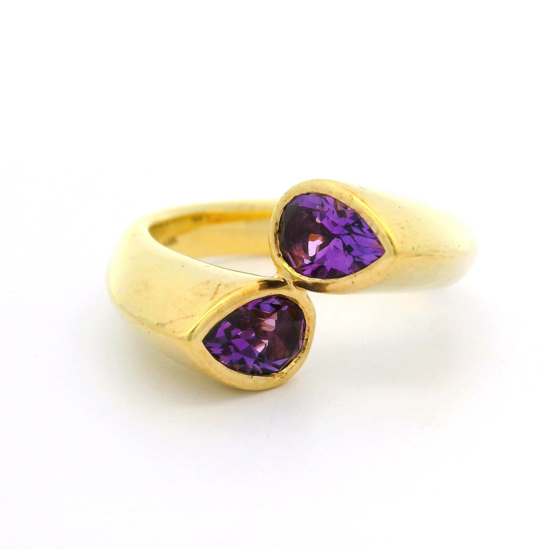 John Atencio 14K Yellow Gold Pear Amethyst Bypass Ring 1.50ctw with Box: John Atencio 14K Yellow Gold Pear Amethyst Bypass Ring 1.50ctw with Box Elevate your style with this stunning John Atencio bypass statement ring, expertly crafted in solid 14k yellow gold. This exquis