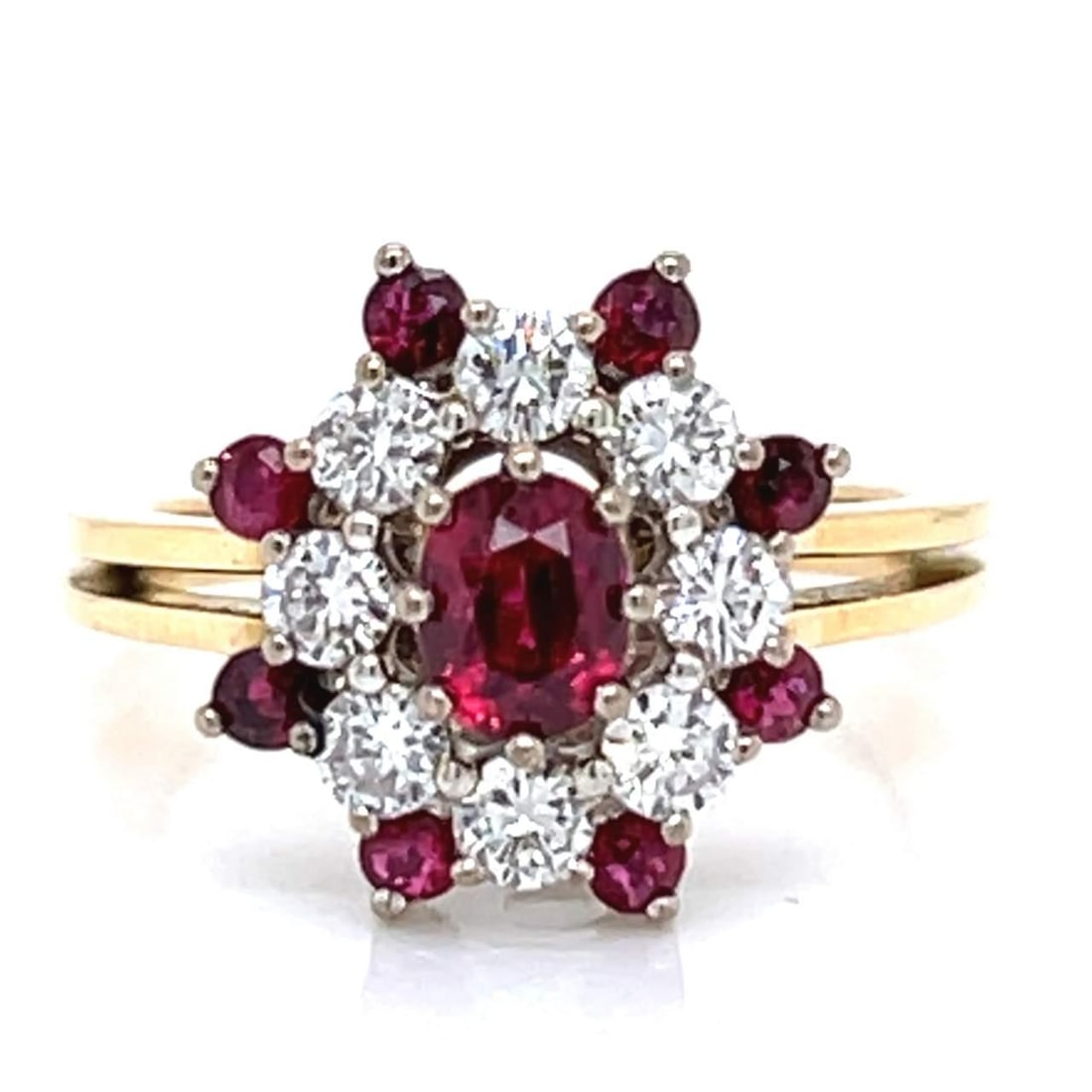 18K Yellow Gold Ruby Diamond Ring 0.60 Ct Center F-G VVS-VS: 18K Yellow Gold Ruby Diamond Ring 0.60 Ct Center F-G VVS-VS This stunning 18K Yellow Gold Ring features a central ruby weighing approximately 0.60 Ct, surrounded by 8 additional rubies totaling around