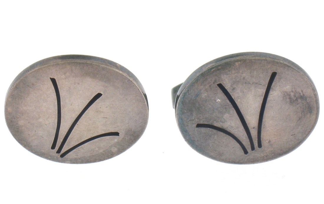 Vintage Hans Gustav Hansen .925 Sterling Silver Black Enamel Cuff Links: Vintage Hans Gustav Hansen .925 Sterling Silver Black Enamel Cuff Links These exquisite vintage cuff links by Hans Gustav Hansen are a stunning example of 1950s craftsmanship. Made from .925 sterling