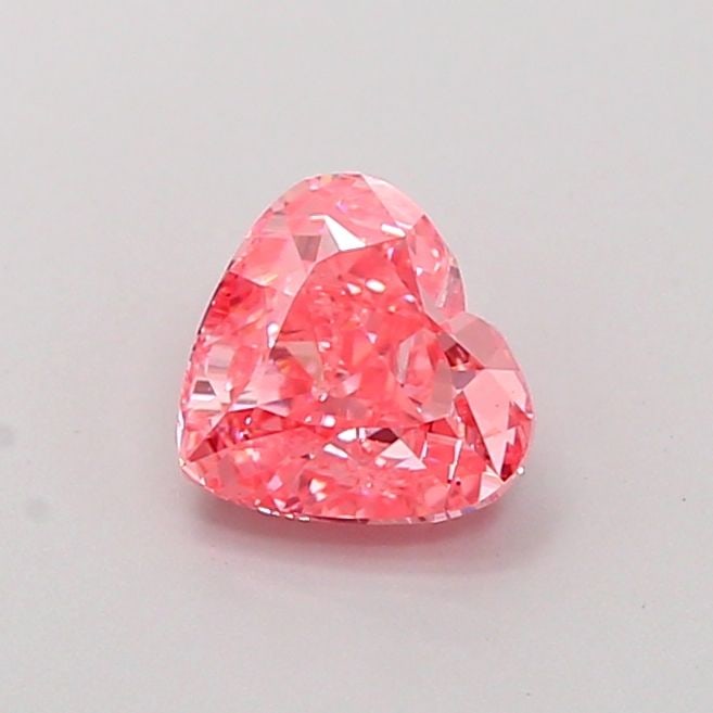 Loose Diamond - HEART 1.0ct Fancy Vivid Pink VS2: Loose Diamond - HEART 1.0ct Fancy Vivid Pink VS2 Source: This is a real non-mined Diamond that has been grown in a lab Shape: HEART Carats: 1.0 Color: Fancy Vivid Pink Certification: IGI Video: