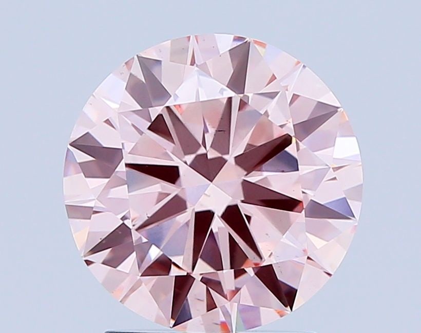 Loose Diamond - ROUND 2.0ct Fancy Pink VS2: Loose Diamond - ROUND 2.0ct Fancy Pink VS2 Source: This is a real non-mined Diamond that has been grown in a lab Shape: ROUND Carats: 2.0 Color: Fancy Pink Certification: IGI Video: