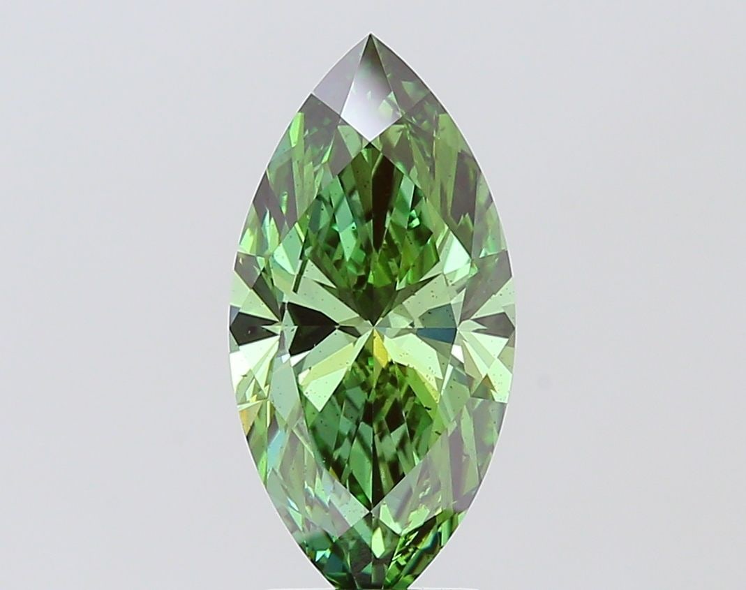 Loose Diamond - MARQUISE 3.02ct Fancy Vivid Green SI1: Loose Diamond - MARQUISE 3.02ct Fancy Vivid Green SI1 Source: This is a real non-mined Diamond that has been grown in a lab Shape: MARQUISE Carats: 3.02 Color: Fancy Vivid Green Certification: IGI The