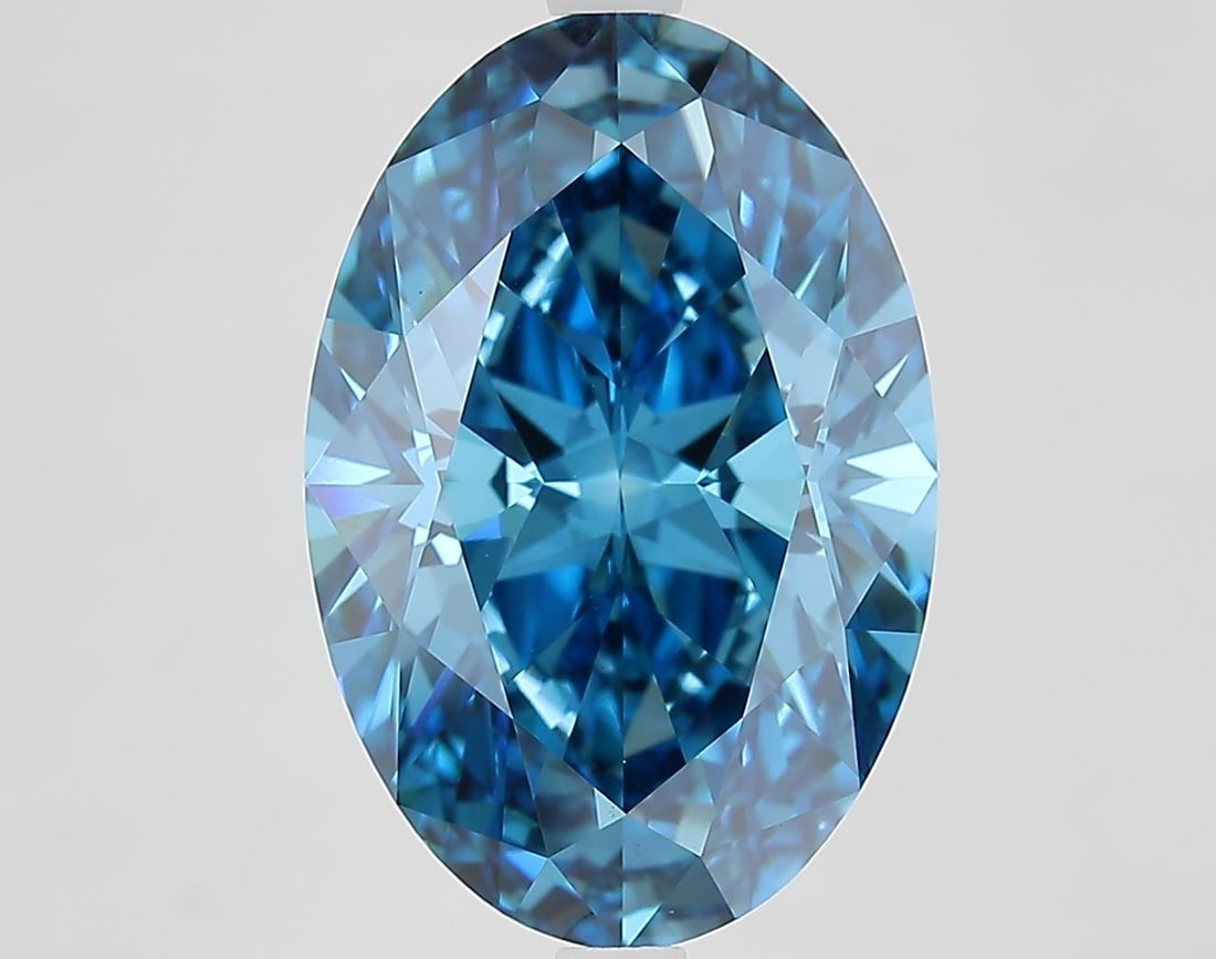 Loose Diamond - OVAL 6.32ct Fancy Vivid Blue VVS2: Loose Diamond - OVAL 6.32ct Fancy Vivid Blue VVS2 Source: This is a real non-mined Diamond that has been grown in a lab Shape: OVAL Carats: 6.32 Color: Fancy Vivid Blue Certification: IGI Video: