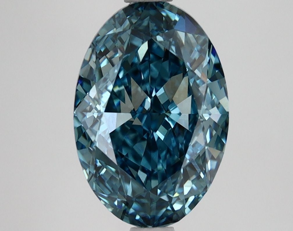 Loose Diamond - OVAL 3.04ct Fancy Vivid Blue VVS2: Loose Diamond - OVAL 3.04ct Fancy Vivid Blue VVS2 Source: This is a real non-mined Diamond that has been grown in a lab Shape: OVAL Carats: 3.04 Color: Fancy Vivid Blue Certification: IGI Video: