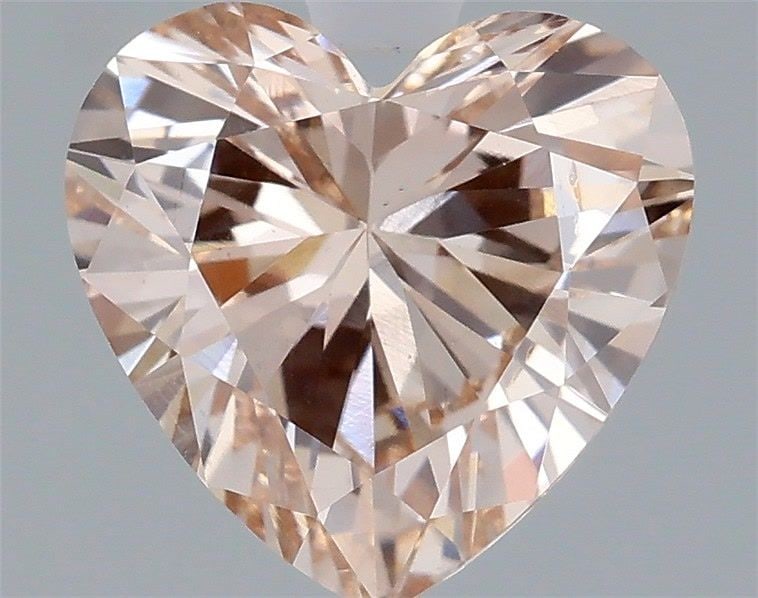 Loose Diamond - HEART 0.9ct Fancy Light Pinkish Brown VS1: Loose Diamond - HEART 0.9ct Fancy Light Pinkish Brown VS1 Source: This is a real non-mined Diamond that has been grown in a lab Shape: HEART Carats: 0.9 Color: Fancy Light Pinkish Brown Certification: