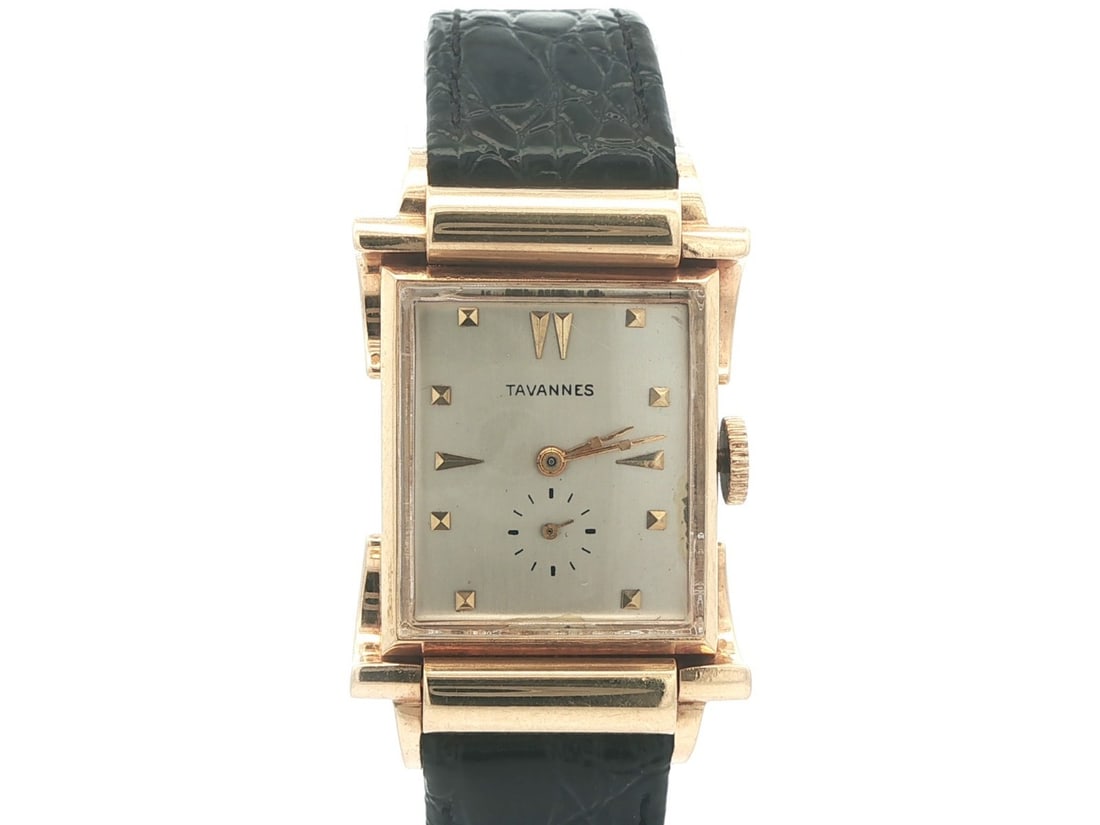 Rectangular 14k Yellow Gold Tavannes 22mm Manual Wind Wristwatch with Fancy Lugs: Rectangular 14k Yellow Gold Tavannes 22mm Manual Wind Wristwatch with Fancy Lugs This vintage Tavannes wristwatch features a rectangular case crafted from solid 14k yellow gold, measuring 22mm in widt