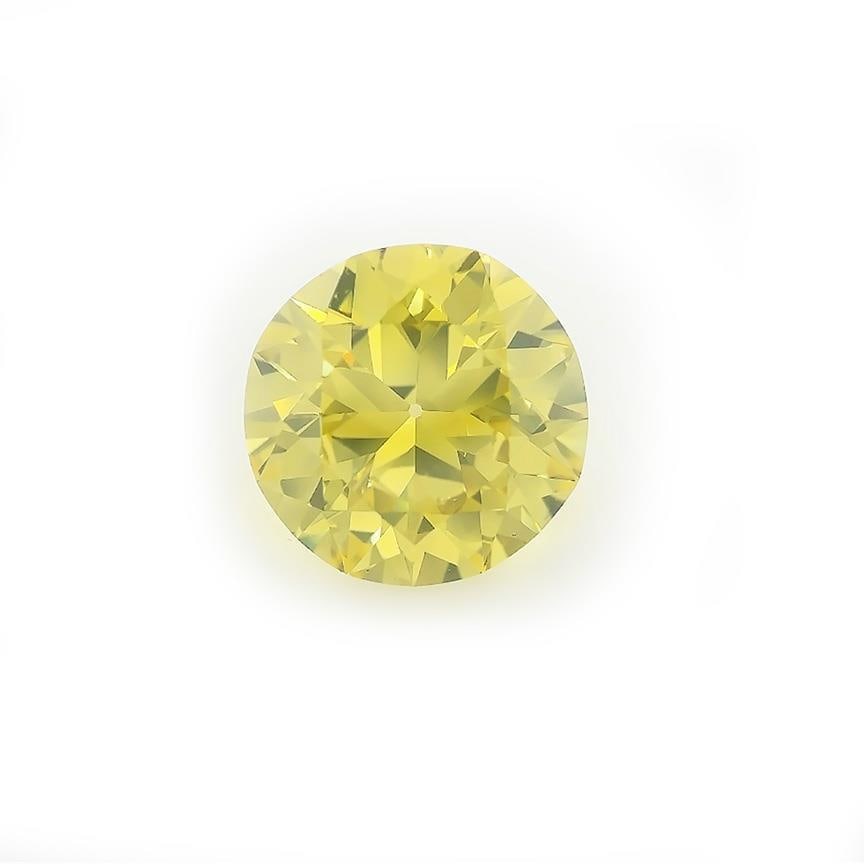 3.36 Carat Round Cut Irradiated Yellow Solitaire Diamond: 3.36 Carat Round Cut Irradiated Yellow Solitaire Diamond Presenting a stunning round cut solitaire diamond weighing 3.36 carats, featuring an irradiated yellow hue. This exquisite diamond, perfect for