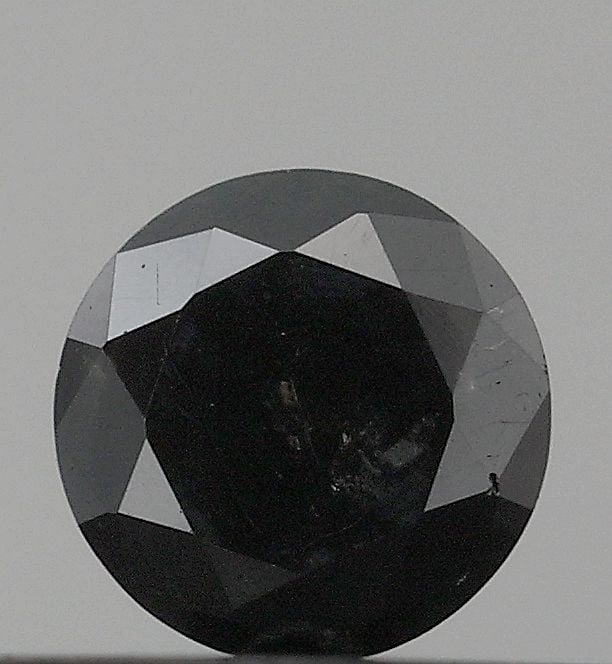 Loose Diamond - ROUND 1.24ct Fancy Black VS1: Loose Diamond - ROUND 1.24ct Fancy Black VS1 Source: Natural Shape: ROUND Carats: 1.24 Color: Fancy Black Certification: NONE Video: