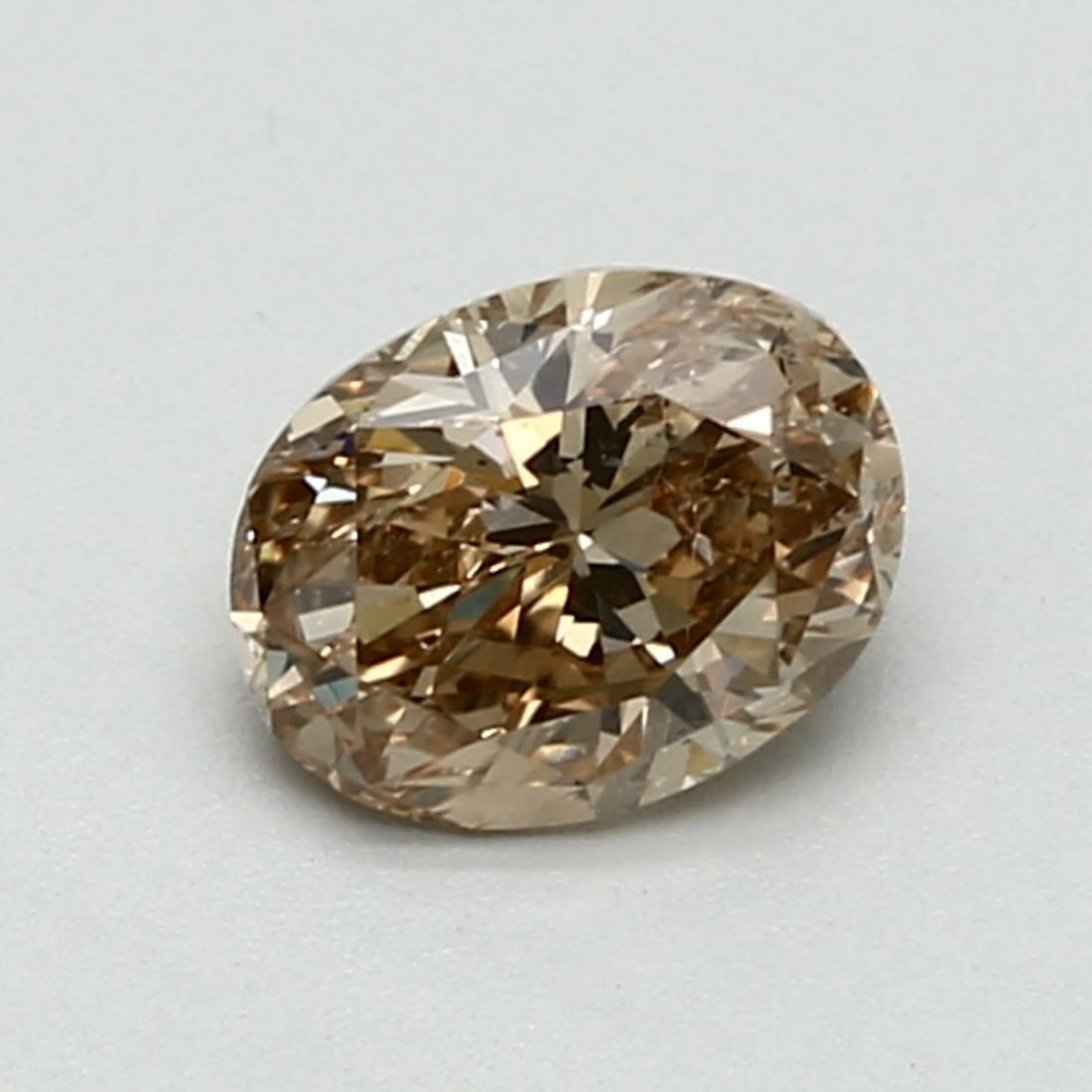 Loose Diamond - OVAL 1.02ct Fancy Brown Yellow SI1: Loose Diamond - OVAL 1.02ct Fancy Brown Yellow SI1 Source: Natural Shape: OVAL Carats: 1.02 Color: Fancy Brown Yellow Certification: GIA The Diamond Depot Guarantee: All items in this auction are guar