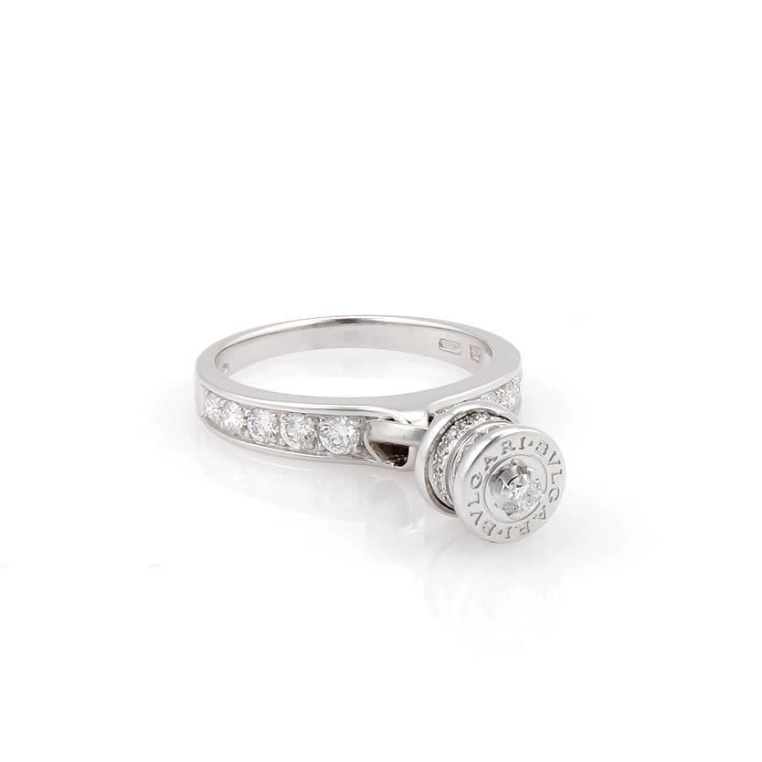 Bvlgari B Zero.1 Element Diamond Charm Ring 18k White Gold: Bvlgari B Zero.1 Element Diamond Charm Ring 18k White Gold Experience elegance with this authentic Bvlgari B Zero.1 Element Ring, beautifully crafted from 18k white gold. This exquisite charm ring fea