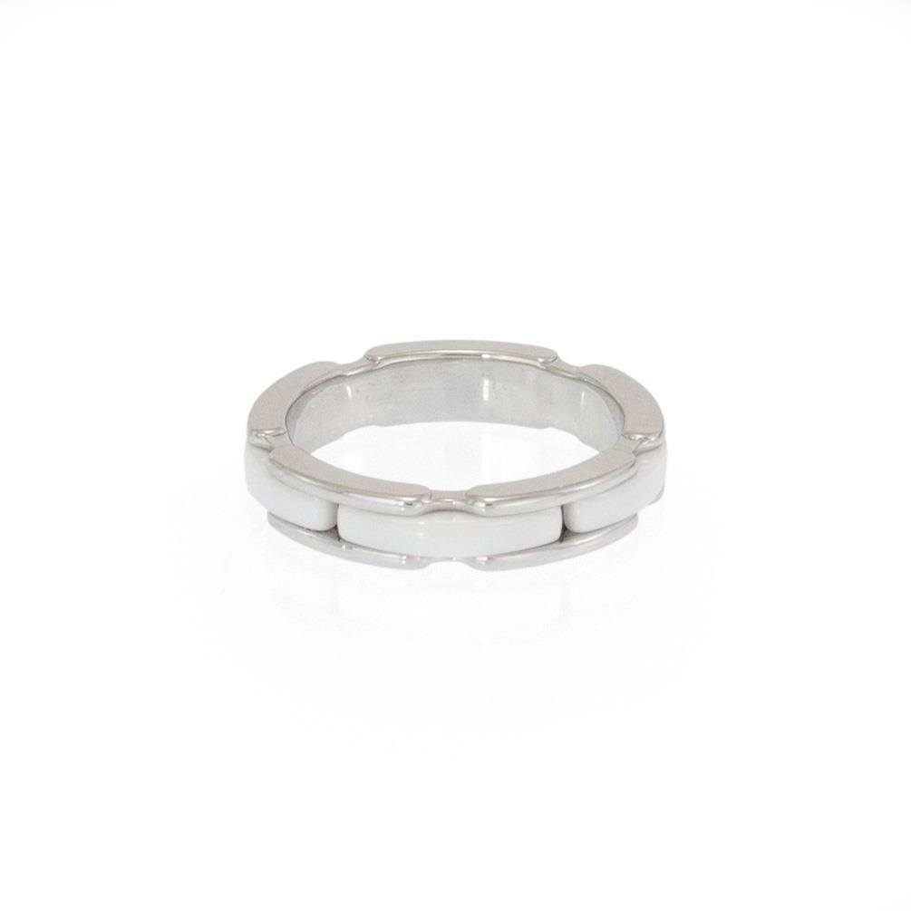 Chanel Ultra Collection 18k White Gold Ceramic Band Ring Size 5: Chanel Ultra Collection 18k White Gold Ceramic Band Ring Size 5 Experience the elegance of the Chanel Ultra White Ceramic and 18k White Gold Single Row Band Ring. This exquisite piece from the Ultra C