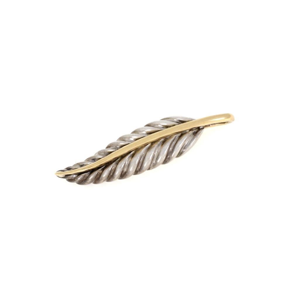 Tiffany & Co. Feather Leaf Pendant Sterling Silver 18k Gold Accents: Tiffany & Co. Feather Leaf Pendant Sterling Silver 18k Gold Accents This exquisite Tiffany & Co. pendant is part of the Feather Leaf collection, showcasing a beautiful design that mimics the delicate