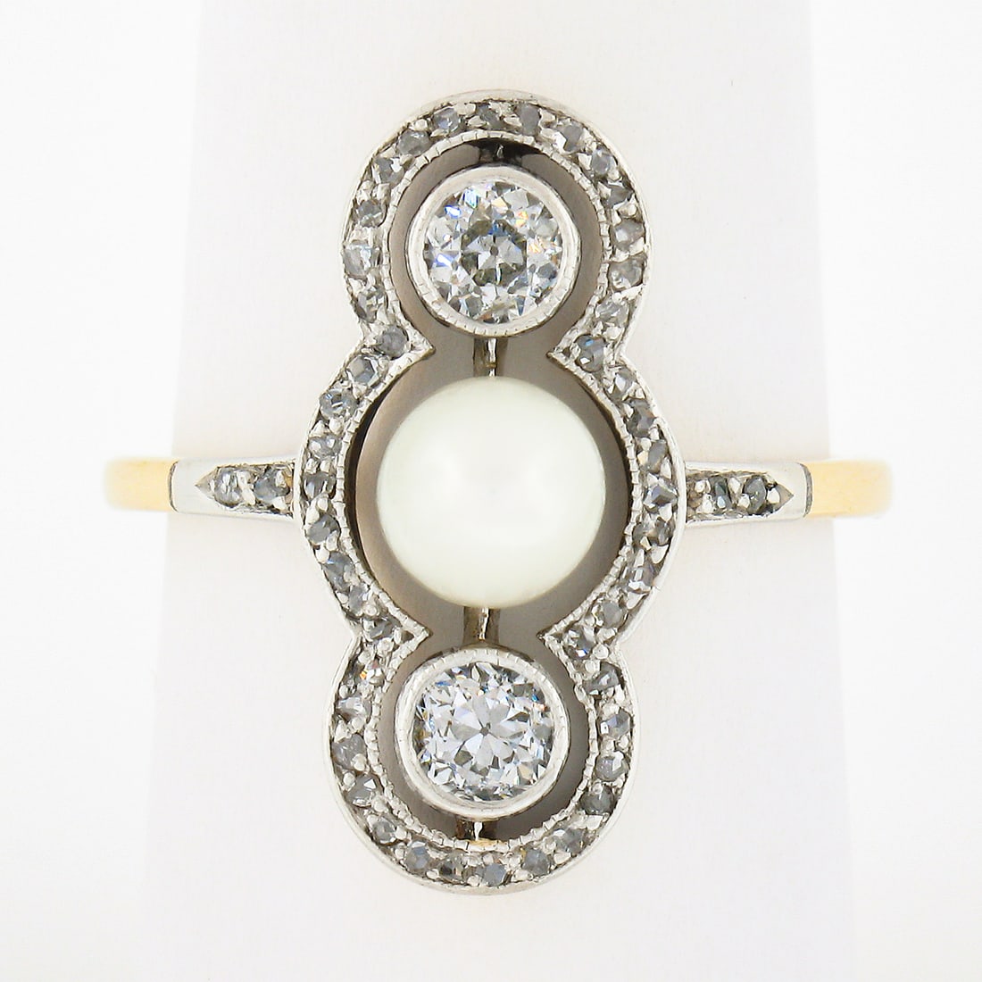 Edwardian 14K Gold Platinum Diamond Pearl Cocktail Ring 0.82ctw: Edwardian 14K Gold Platinum Diamond Pearl Cocktail Ring 0.82ctw This exquisite Antique Edwardian ring is a stunning blend of 14K yellow gold and platinum, featuring a round 5.9mm cultured pearl at its