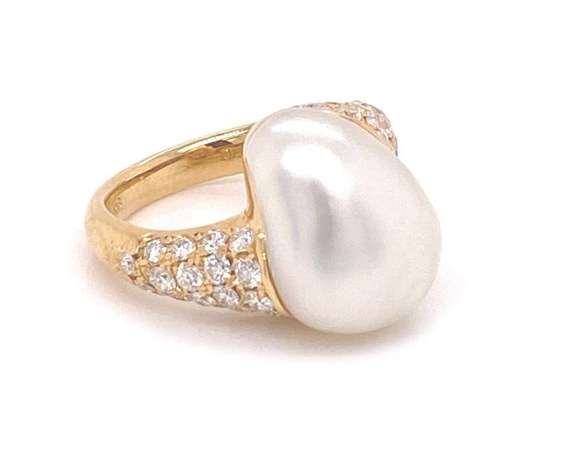 Size 4 Mikimoto Diamond Akoya Pearl Ring in 18k Yellow Gold: Size 4 Mikimoto Diamond Akoya Pearl Ring in 18k Yellow Gold This Mikimoto ring is crafted from 18k yellow gold and features a combination of diamonds totaling 0.83ct and an Akoya pearl measuring 15.6m
