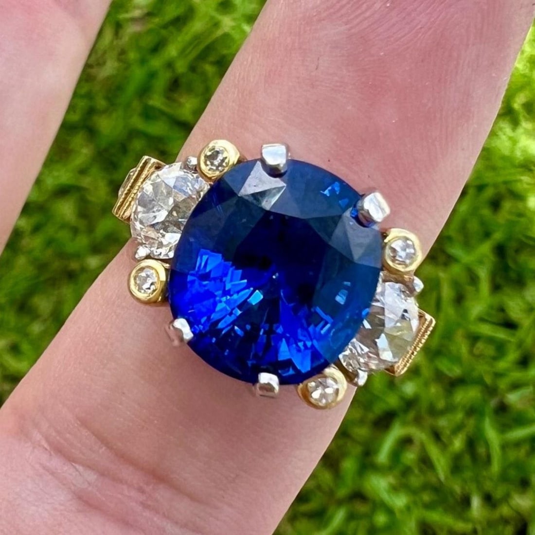AGL Certified 7.03 Ct Sapphire & Diamond Ring in Platinum and 18K Gold: AGL Certified 7.03 Ct Sapphire & Diamond Ring in Platinum and 18K Gold This exquisite ring features a stunning 7.03 Ct. AGL Certified Madagascar Heated Sapphire, elegantly set in a combination of plat