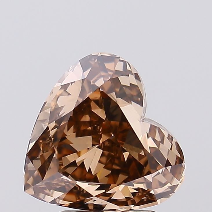 Loose Diamond - HEART 3.08ct Fancy Brown VS1: Loose Diamond - HEART 3.08ct Fancy Brown VS1 Source: This is a real non-mined Diamond that has been grown in a lab Shape: HEART Carats: 3.08 Color: Fancy Brown Certification: IGI Video: