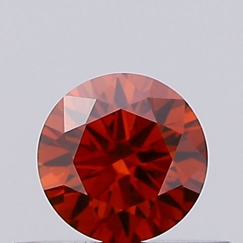 Ideal Loose Diamond - ROUND 0.28ct Fancy Vivid Orange VS2: Ideal Loose Diamond - ROUND 0.28ct Fancy Vivid Orange VS2 Source: This is a real non-mined Diamond that has been grown in a lab Shape: ROUND Carats: 0.28 Color: Fancy Vivid Orange Certification: IGI V