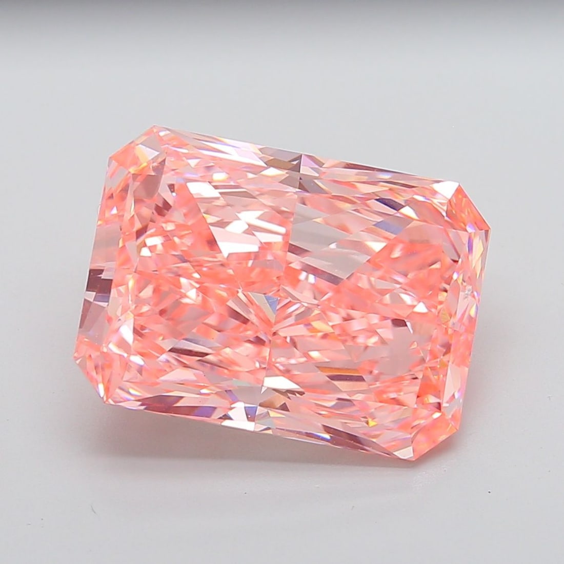 Loose Diamond - RADIANT 16.01ct Fancy Vivid Pink VVS2: Loose Diamond - RADIANT 16.01ct Fancy Vivid Pink VVS2 Source: This is a real non-mined Diamond that has been grown in a lab Shape: RADIANT Carats: 16.01 Color: Fancy Vivid Pink Certification: IGI Vide