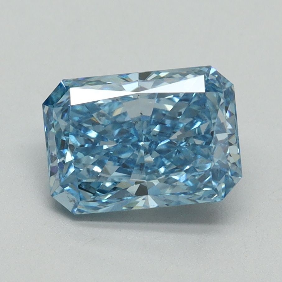 Loose Diamond - RADIANT 1.59ct Fancy Vivid Blue SI1: Loose Diamond - RADIANT 1.59ct Fancy Vivid Blue SI1 Source: This is a real non-mined Diamond that has been grown in a lab Shape: RADIANT Carats: 1.59 Color: Fancy Vivid Blue Certification: IGI Video:
