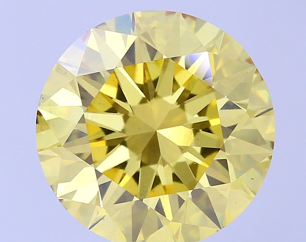 Loose Diamond - ROUND 10.03ct Fancy Vivid Yellow VS1: Loose Diamond - ROUND 10.03ct Fancy Vivid Yellow VS1 Source: This is a real non-mined Diamond that has been grown in a lab Shape: ROUND Carats: 10.03 Color: Fancy Vivid Yellow Certification: IGI Video