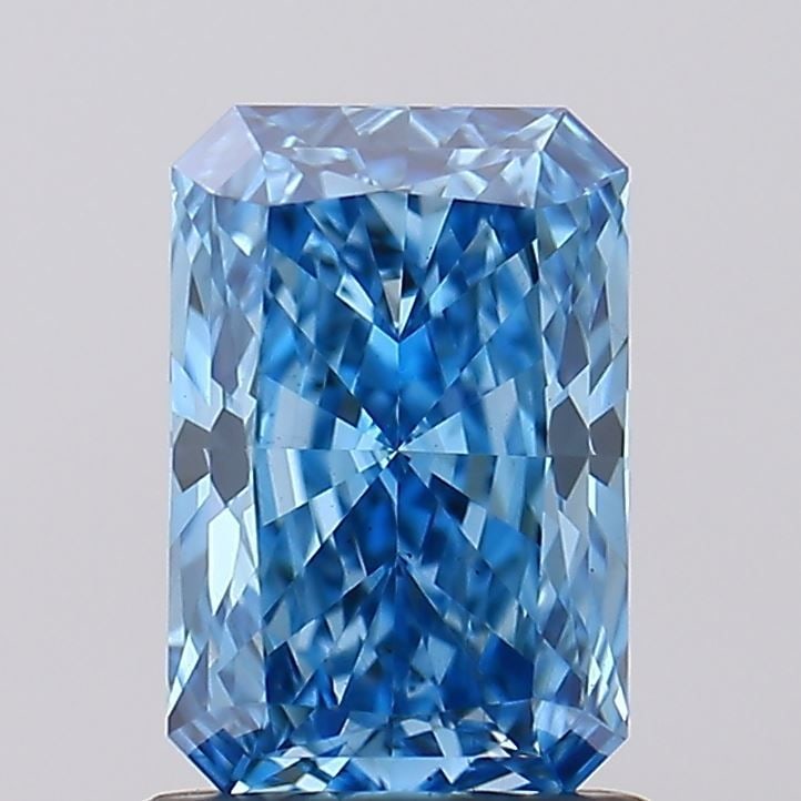Loose Diamond - RADIANT 1.11ct Fancy Vivid Blue VS2: Loose Diamond - RADIANT 1.11ct Fancy Vivid Blue VS2 Source: This is a real non-mined Diamond that has been grown in a lab Shape: RADIANT Carats: 1.11 Color: Fancy Vivid Blue Certification: IGI Video: