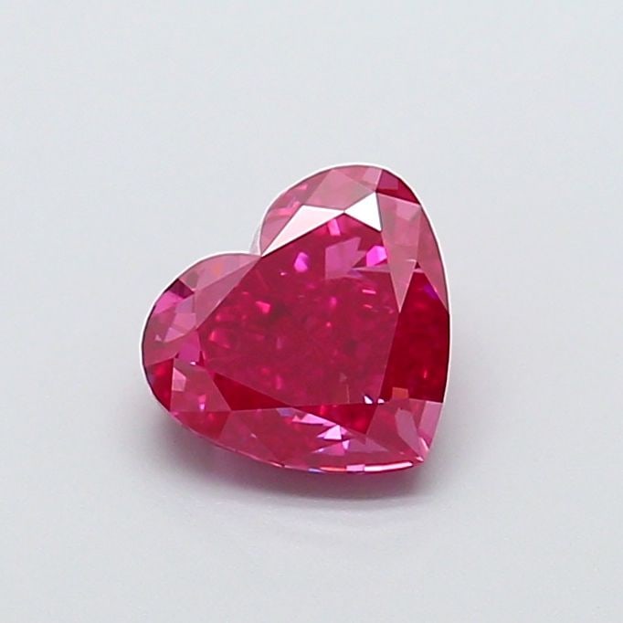 Loose Diamond - HEART 1.56ct Fancy Vivid Pink VS1: Loose Diamond - HEART 1.56ct Fancy Vivid Pink VS1 Source: This is a real non-mined Diamond that has been grown in a lab Shape: HEART Carats: 1.56 Color: Fancy Vivid Pink Certification: NONE Video: