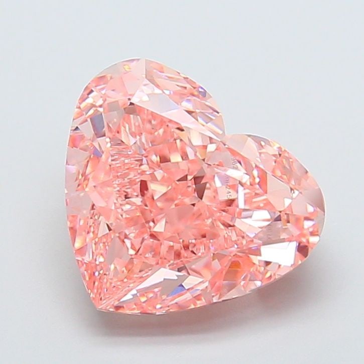 Loose Diamond - HEART 7.09ct Fancy Vivid Pink VS1: Loose Diamond - HEART 7.09ct Fancy Vivid Pink VS1 Source: This is a real non-mined Diamond that has been grown in a lab Shape: HEART Carats: 7.09 Color: Fancy Vivid Pink Certification: IGI Video: