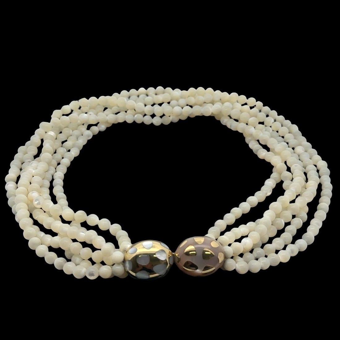 Tiffany & Co. 18k Gold & Mother Of Pearl Multi Strand Necklace: Tiffany & Co. 18k Gold & Mother Of Pearl Multi Strand Necklace This exquisite multi-strand bead necklace features numerous natural mother of pearl beads, each approximately 5.8mm in size. The round be