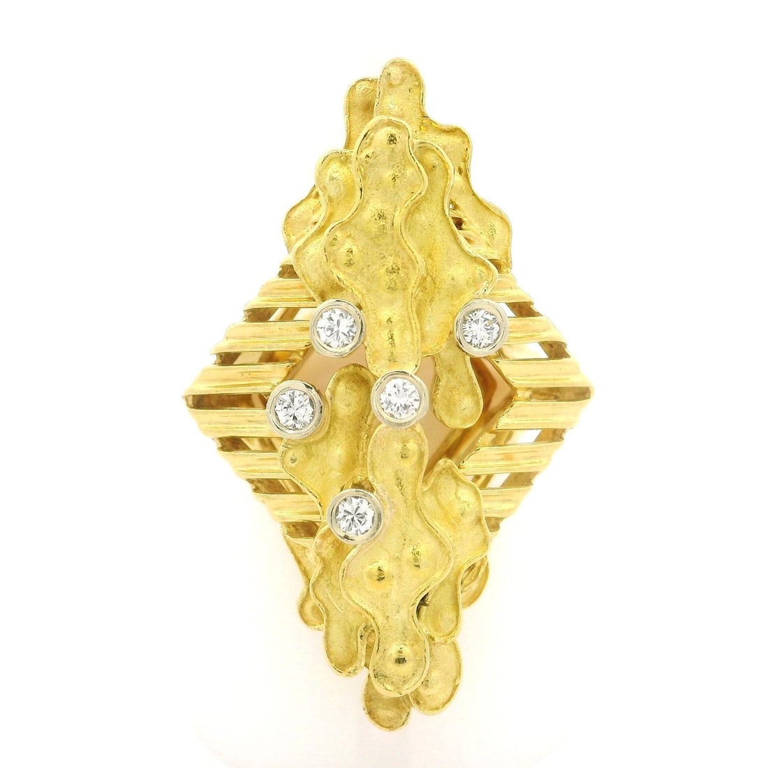 18k Yellow Gold .20ctw Diamond Textured Geometric Cocktail Ring: 18k Yellow Gold .20ctw Diamond Textured Geometric Cocktail Ring This stunning cocktail ring is crafted from solid 18k yellow gold, showcasing a unique dual finish and a textured surface that creates a