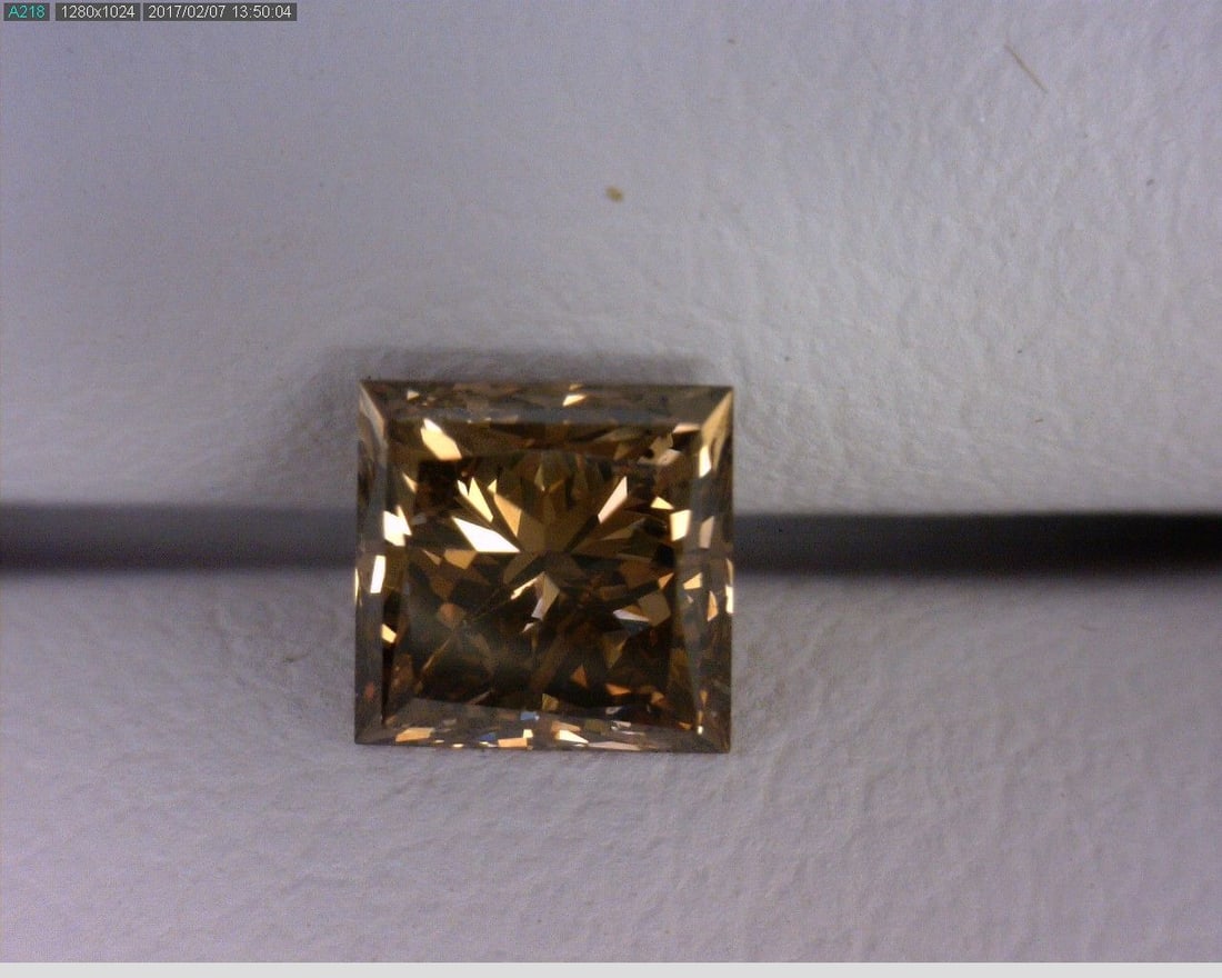Loose Diamond - PRINCESS 0.5ct Brown SI1: Loose Diamond - PRINCESS 0.5ct Brown SI1 Source: Natural Shape: PRINCESS Carats: 0.5 Color: Brown Certification: OTHER The Diamond Depot Guarantee: All items in this auction are guaranteed to be 100%