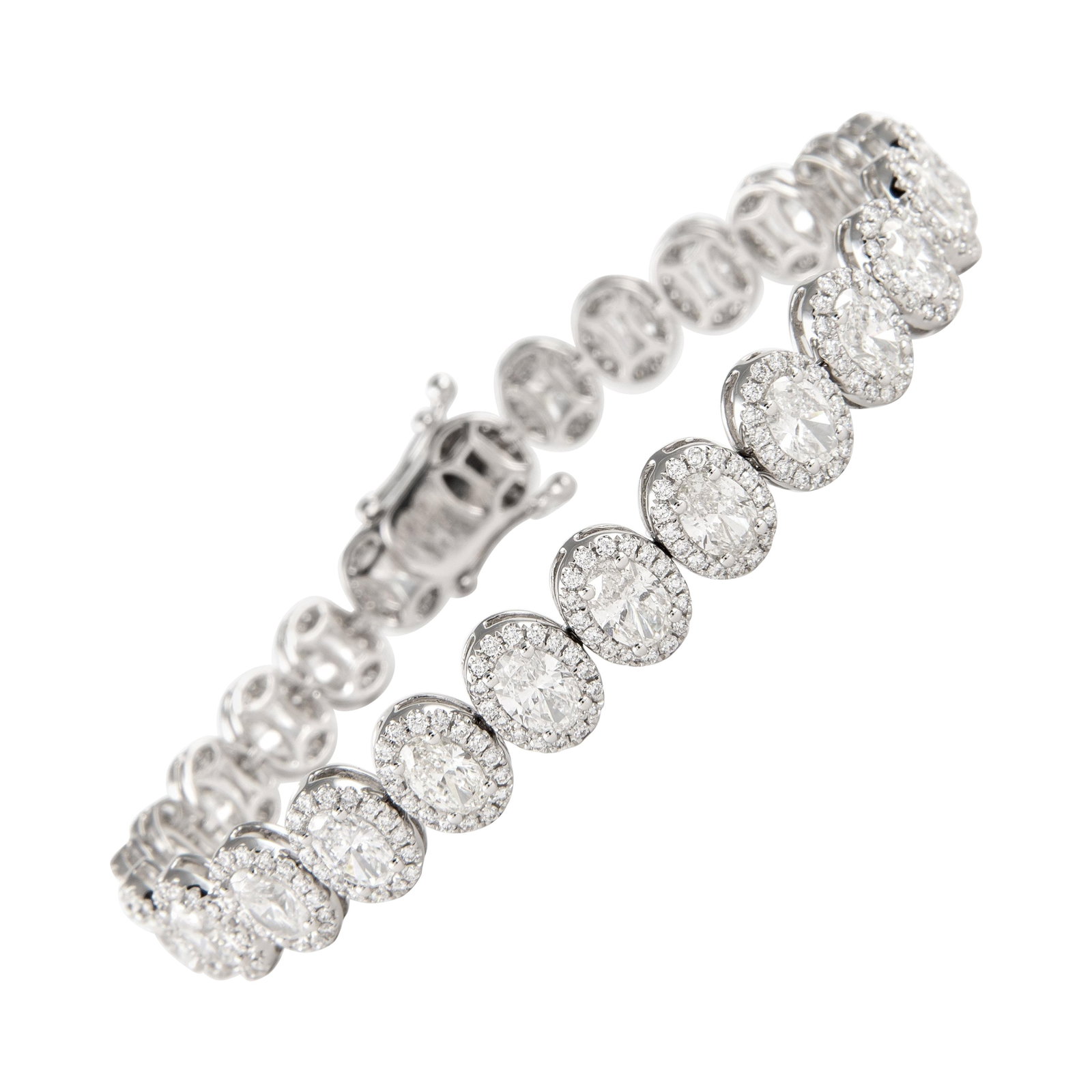 9.89ct Oval Diamond Tennis Bracelet 18k White Gold: 9.89ct Oval Diamond Tennis Bracelet 18k White Gold This exquisite tennis bracelet features a stunning arrangement of oval diamonds set in luxurious 18k white gold. With a total diamond weight of 9.89