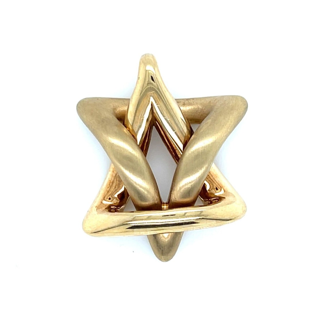 Vintage 14k Gold Interlocking Star of David Puffed Charm Pendant: Vintage 14k Gold Interlocking Star of David Puffed Charm Pendant This vintage puffed interlocking Star of David charm pendant is crafted from 14k yellow gold. It features a unique interlocking design