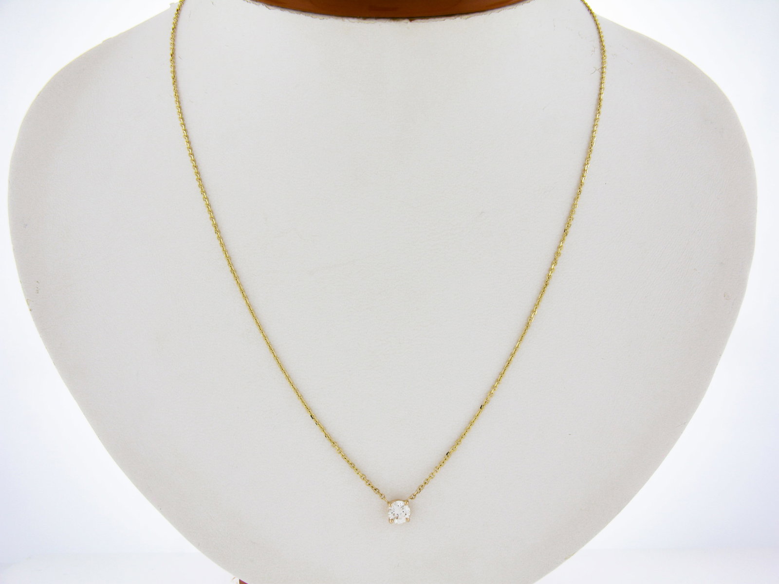 14K Yellow Gold 0.49ct Diamond Solitaire Pendant Necklace Adjustable Chain: 14K Yellow Gold 0.49ct Diamond Solitaire Pendant Necklace Adjustable Chain This elegant necklace features a stunning solitaire pendant crafted from solid 14K yellow gold. The pendant showcases a round