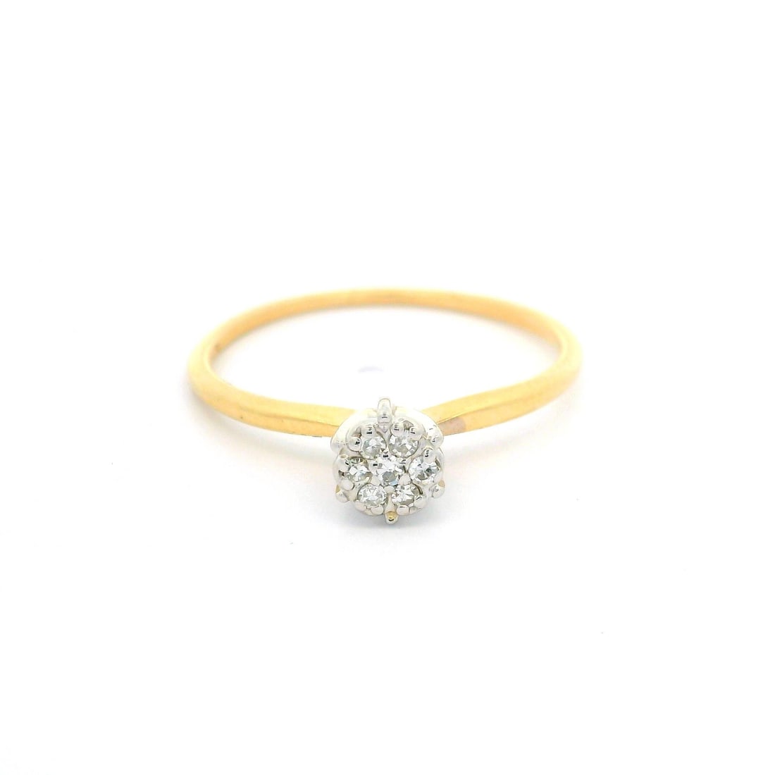 14k Yellow Gold Diamond Cluster Engagement Ring 0.10ctw: 14k Yellow Gold Diamond Cluster Engagement Ring 0.10ctw This exquisite 14k Yellow Gold Engagement Ring features a petite solitaire design adorned with a cluster of seven natural genuine diamonds, each