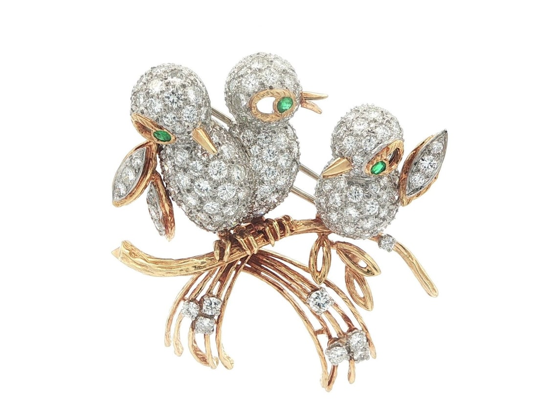 Three Birds on Branch Brooch in 18K Gold Platinum with Diamonds and Emeralds 4.12ctw: Three Birds on Branch Brooch in 18K Gold Platinum with Diamonds and Emeralds 4.12ctw This vintage brooch features three birds perched on a branch, crafted from solid 17-18K yellow gold with platinum a