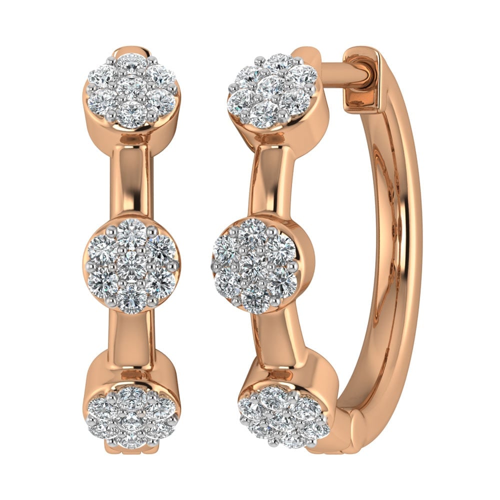 Diamond 1/5 Ct.Tw. Cluster Hoop Earrings in 10K Rose Gold: Diamond 1/5 Ct.Tw. Cluster Hoop Earrings in 10K Rose Gold 10k Rose Gold Stone Color: G-h Stone Clarity: I1 The Diamond Depot Guarantee: All items in this auction are guaranteed to be 100% authentic. A