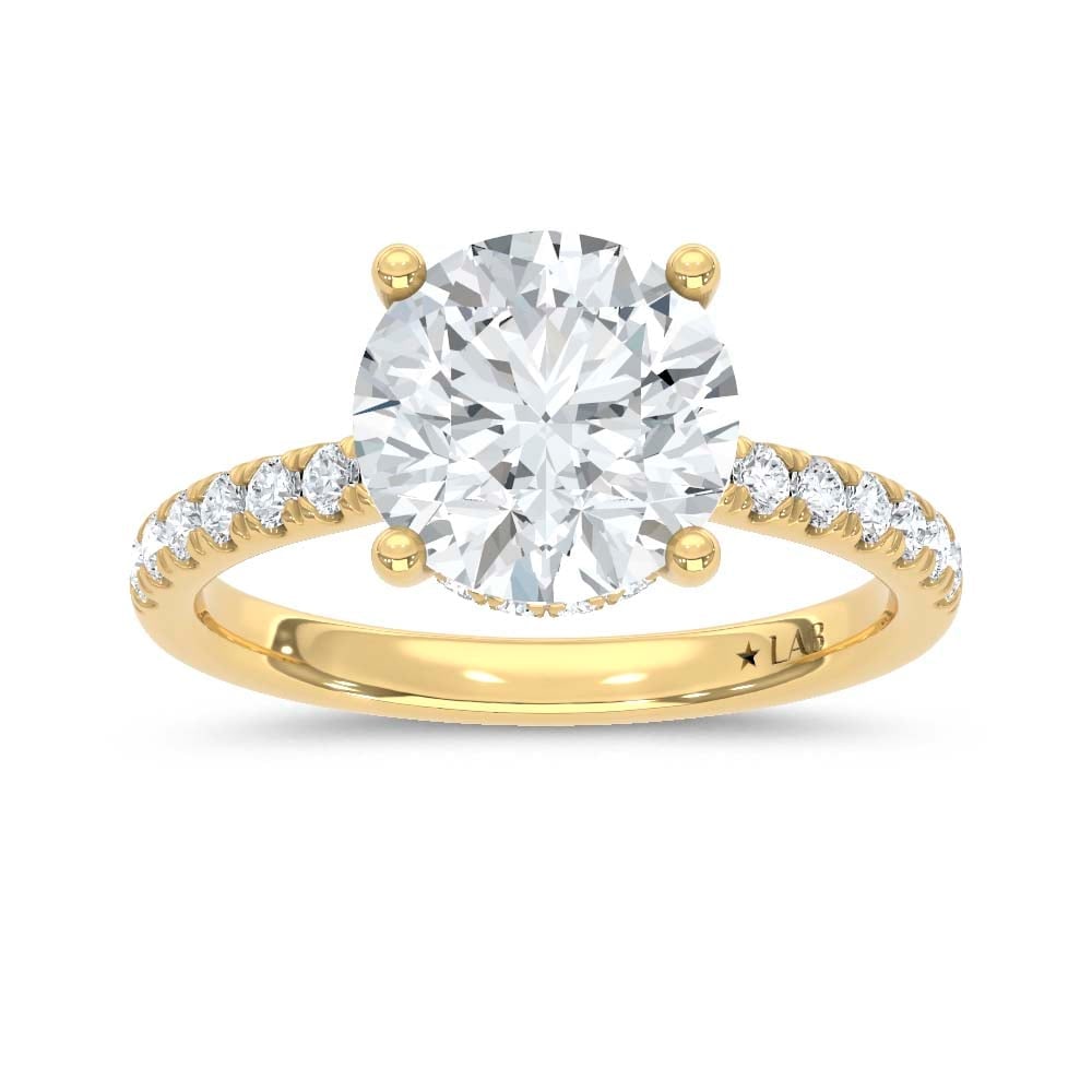 14K Yellow Gold Lab Grown Diamond 2 3/8 Ct.Tw. Round Hidden Halo Engagement Ring (IGI Certified: 14K Yellow Gold Lab Grown Diamond 2 3/8 Ct.Tw. Round Hidden Halo Engagement Ring (IGI Certified Center 2ct) Discover subtle brilliance and modern elegance with our Hidden Halo Diamond Engagement Ring.