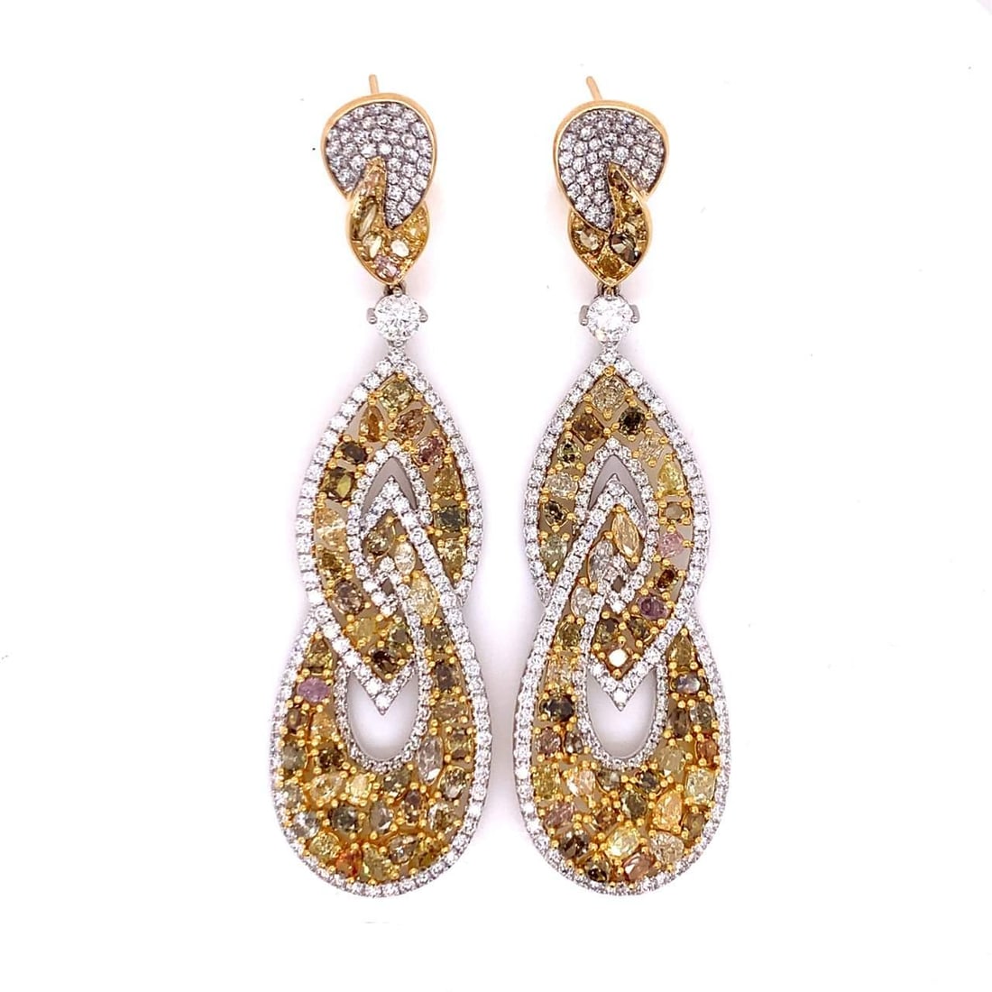 18K White Yellow Gold Fancy Yellow Diamond Earrings 10 Ct VVS-SI1 Clarity: 18K White Yellow Gold Fancy Yellow Diamond Earrings 10 Ct VVS-SI1 Clarity Elevate your style with these stunning Fancy Yellow Diamond Earrings crafted from 18K White and Yellow Gold. Weighing a total