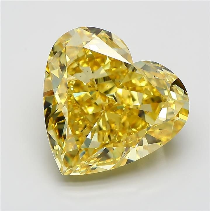 Loose Diamond - HEART 10.1ct Fancy Vivid Yellow VS2: Loose Diamond - HEART 10.1ct Fancy Vivid Yellow VS2 Source: This is a real non-mined Diamond that has been grown in a lab Shape: HEART Carats: 10.1 Color: Fancy Vivid Yellow Certification: IGI Video: