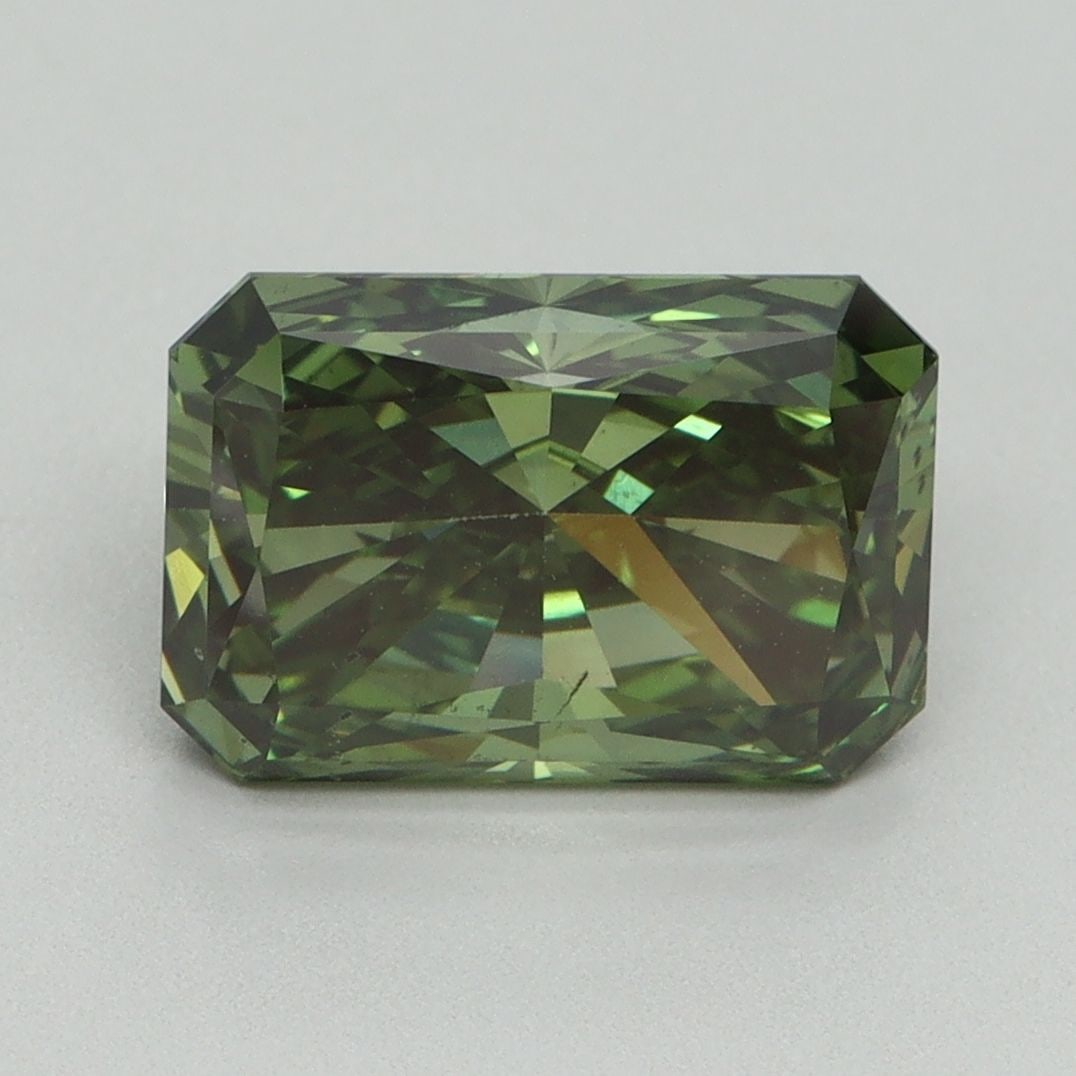 Loose Diamond - RADIANT 3.19ct Fancy Vivid Green VS2: Loose Diamond - RADIANT 3.19ct Fancy Vivid Green VS2 Source: This is a real non-mined Diamond that has been grown in a lab Shape: RADIANT Carats: 3.19 Color: Fancy Vivid Green Certification: IGI Video