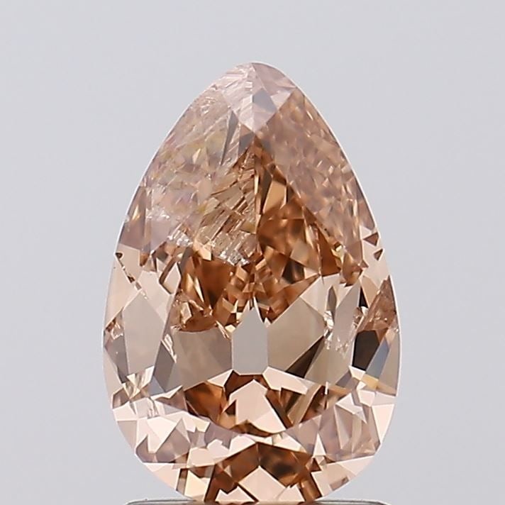 Loose Diamond - PEAR 1.23ct Fancy Brown I1: Loose Diamond - PEAR 1.23ct Fancy Brown I1 Source: This is a real non-mined Diamond that has been grown in a lab Shape: PEAR Carats: 1.23 Color: Fancy Brown Certification: NONE Video: