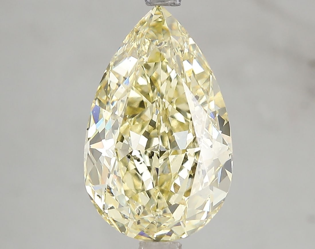 Loose Diamond - PEAR 5.06ct Fancy Intense Yellow SI1: Loose Diamond - PEAR 5.06ct Fancy Intense Yellow SI1 Source: This is a real non-mined Diamond that has been grown in a lab Shape: PEAR Carats: 5.06 Color: Fancy Intense Yellow Certification: IGI Video