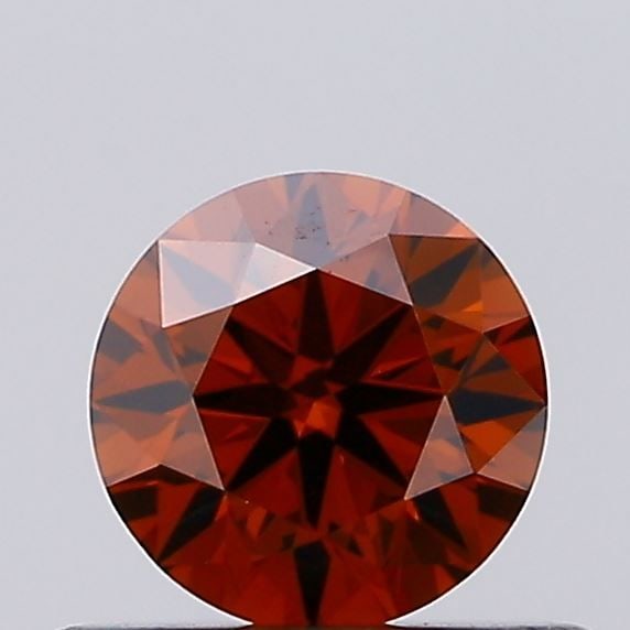 Ideal Loose Diamond - ROUND 0.41ct Fancy Deep Orange VS1: Ideal Loose Diamond - ROUND 0.41ct Fancy Deep Orange VS1 Source: This is a real non-mined Diamond that has been grown in a lab Shape: ROUND Carats: 0.41 Color: Fancy Deep Orange Certification: IGI Vid