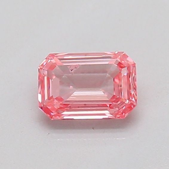Loose Diamond - EMERALD 0.25ct Fancy Vivid Pink SI2: Loose Diamond - EMERALD 0.25ct Fancy Vivid Pink SI2 Source: This is a real non-mined Diamond that has been grown in a lab Shape: EMERALD Carats: 0.25 Color: Fancy Vivid Pink Certification: IGI The Dia
