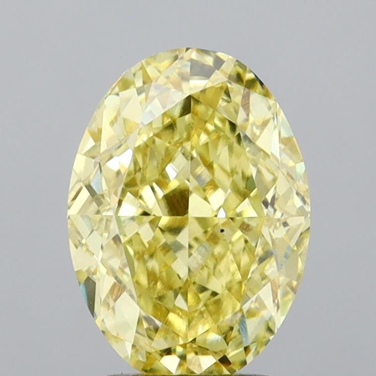 Loose Diamond - OVAL 3.23ct Fancy Intense Yellow VS1: Loose Diamond - OVAL 3.23ct Fancy Intense Yellow VS1 Source: This is a real non-mined Diamond that has been grown in a lab Shape: OVAL Carats: 3.23 Color: Fancy Intense Yellow Certification: IGI Video
