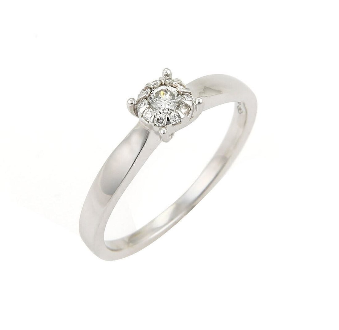 Damiani Bliss Illusion Diamond Ring in 18k White Gold Size 7.25: Damiani Bliss Illusion Diamond Ring in 18k White Gold Size 7.25 This Bliss by Damiani ring features illusion-set diamonds totaling 0.20 carat, crafted in 18k white gold. The ring is a size 7.25 and is